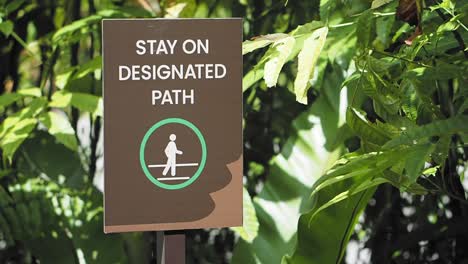 stay on designated path sign