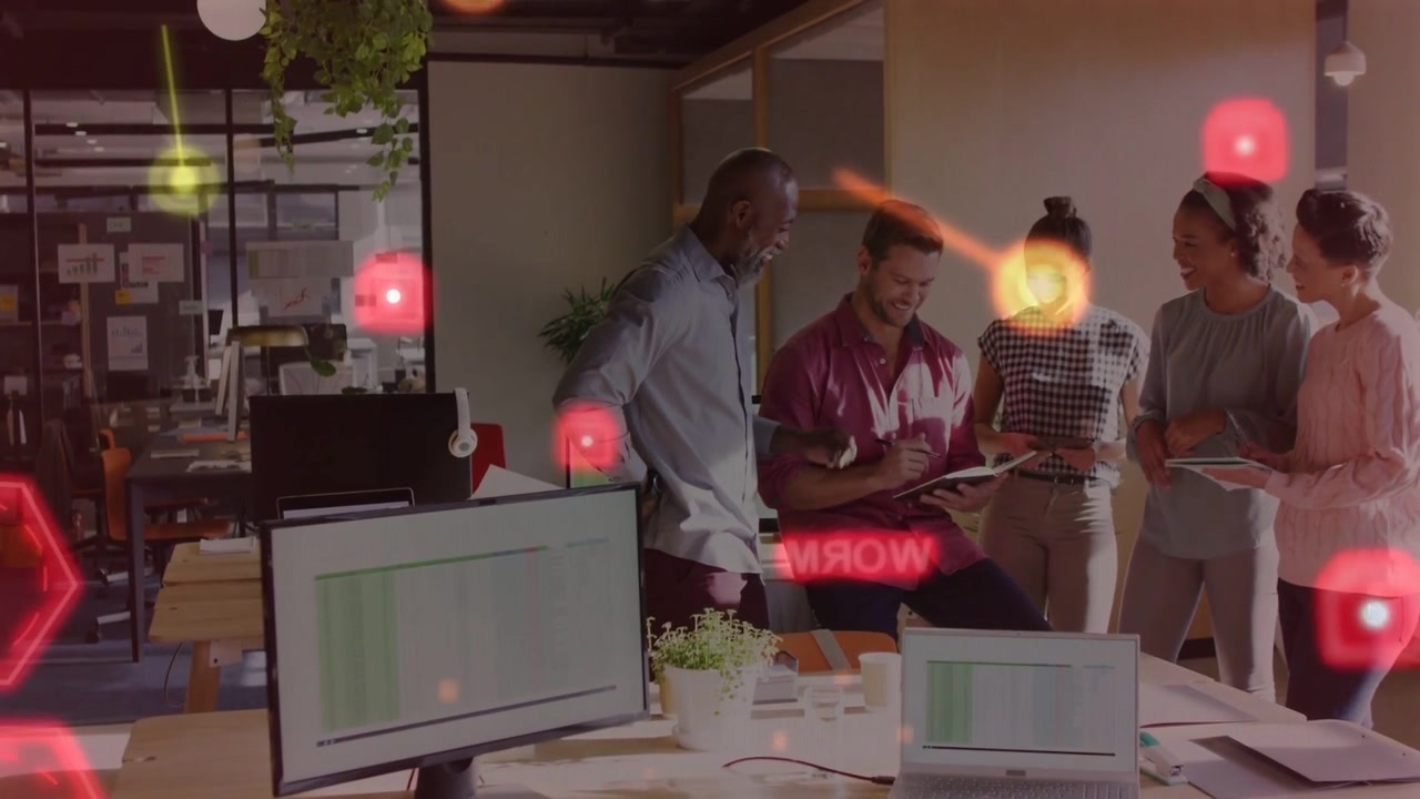 Seated man tapping tablet, team leaning, pointing and reviewing data while HUD animating