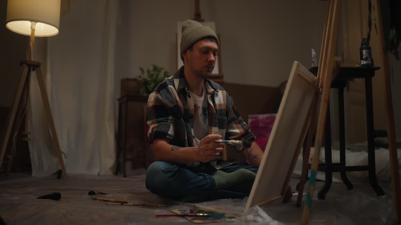 Artist Painting in a Studio
