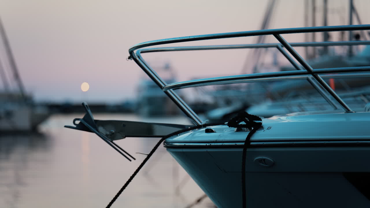 Close up of boats docked in the Cannes harbour in the evening