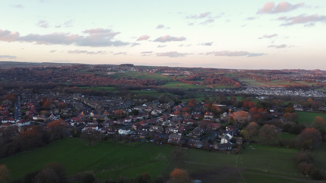 Rising Establishing Aerial Drone Shot Over Calverley Village Houses and Fields at Autumn Sunset in West Yorkshire UK