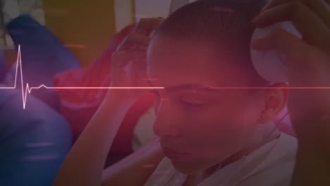 animation of cardiograph over caucasian businesswoman with headphones