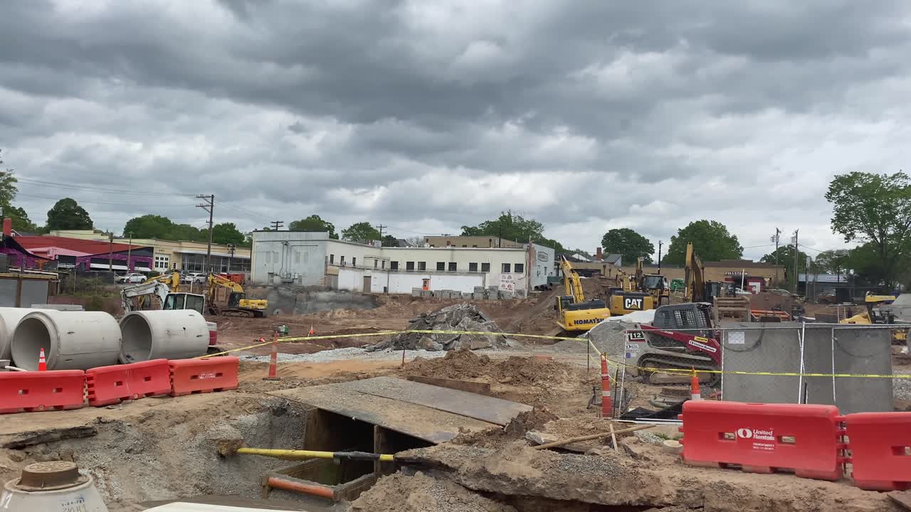 wide shot of construction site in Durham, NC. Dirty and new.
