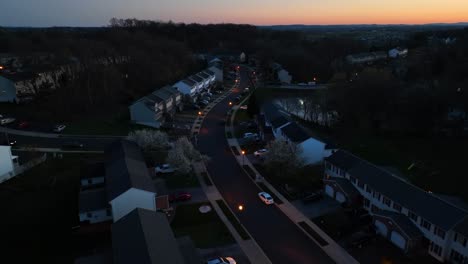 quiet neighborhood of american suburbia after golden sunset