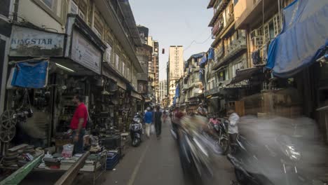 hyper lapse or time lapse shot of a crowded lane of an indian city.