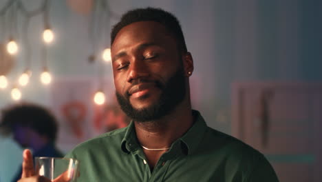 Smiling Man with a Drink