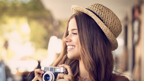 woman taking a photo outdoors