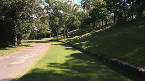 Man-made-rolling-hills-at-the-entrance-of-a-Cemetery