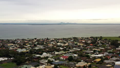 AERIAL-Dolly-Back,-Coastal-Town-Of-Clifton-Springs,-Victoria-Australia