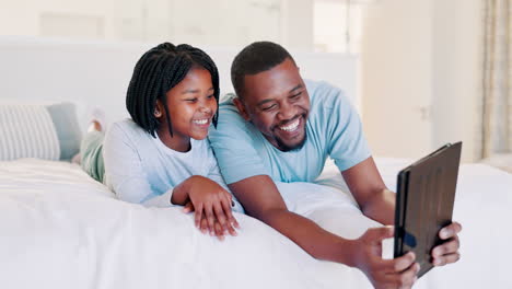 Dad,-child-and-tablet-in-bedroom