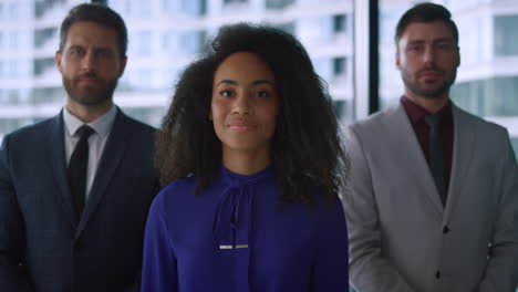 multiethnic business team looking at camera