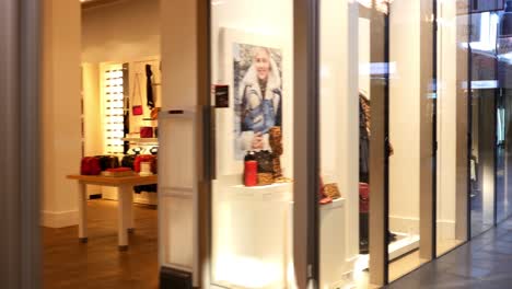 stylish retail store display with bags and clothing