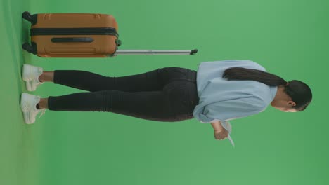 woman with luggage preparing to travel