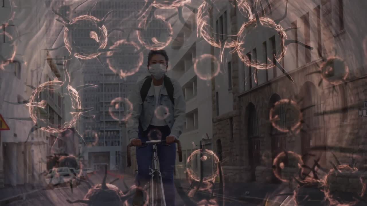 얼굴 마스크를 쓰고 있는 여성에게 퍼지는 거대 코로나바이러스 세포의 애니메이션