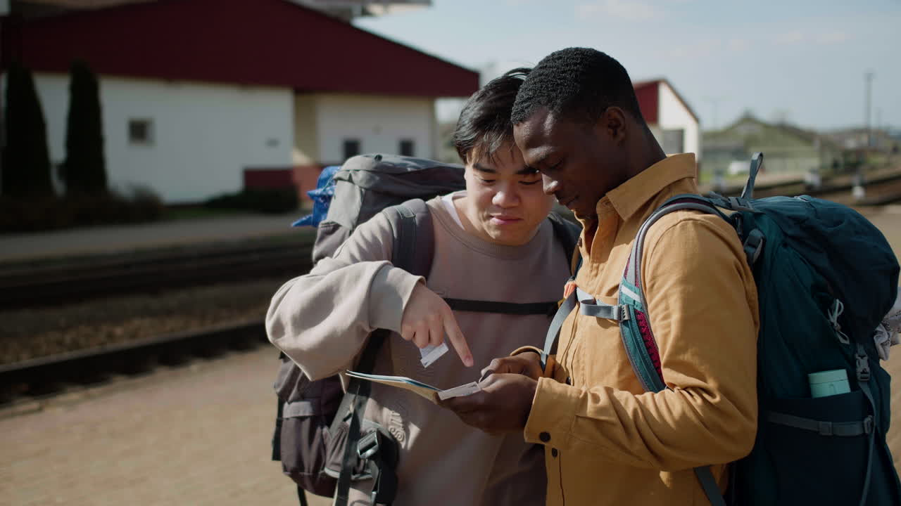 Friends looking the map