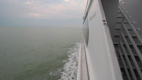 side view of ship sailing in the ocean