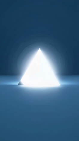 illuminated white pyramid on dark blue background