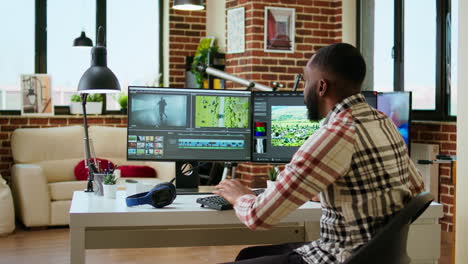 african american man video editor working in video production industry