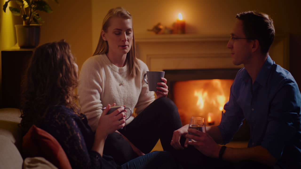 Friends Enjoying Cozy Evening by the Fireplace
