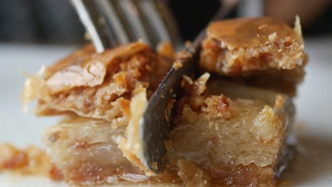 cutting into delicious baklava