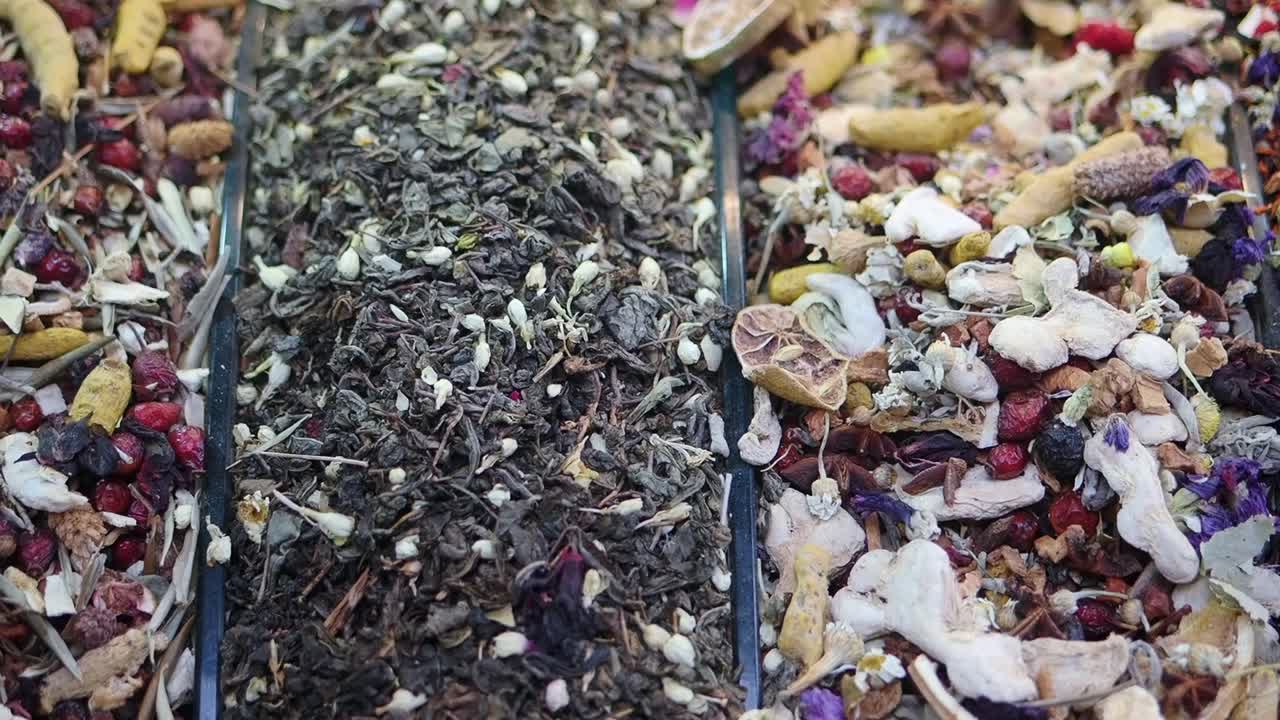 Close-up Panning Shot of Various Dried Herbal Teas and Spices