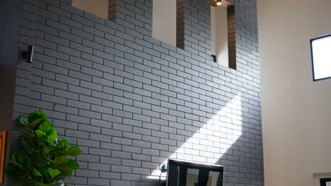 Grey-brick-feature-wall-with-window-cutouts