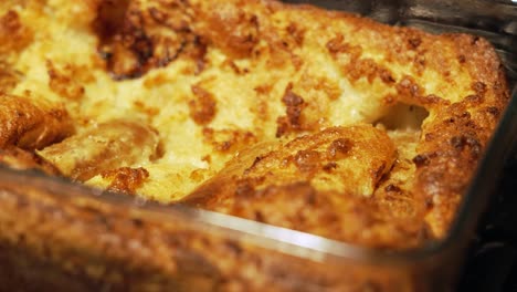 close up of sausages in yorkshire pudding fresh out the oven