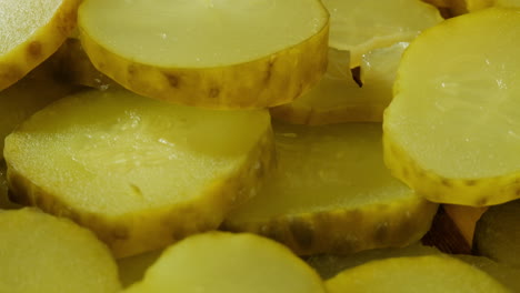 close-up of sliced pickled cucumbers