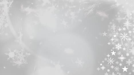 snowflakes falling against white background