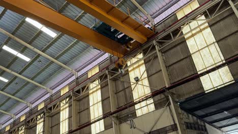 working overhead crane in the industry. orange overhead crane.