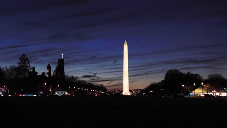 washington monument at night with trafic 4k