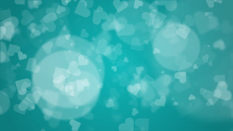 abstract romantic blurred blue background with white hearts and bokeh. looped animation.