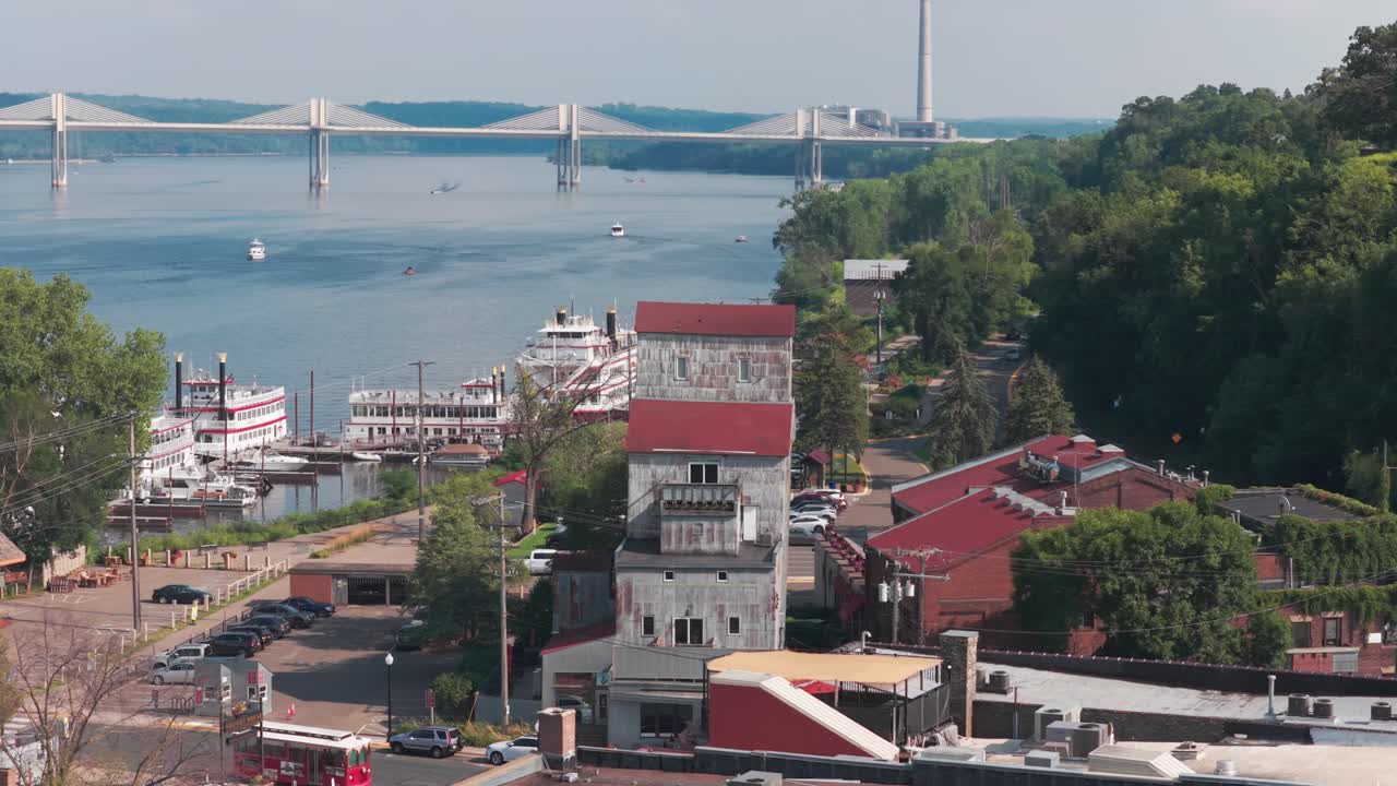 Aerial telephoto panning shot of the historic 19th century Commander Elevator Building in Stillwater, Minnesota. 4K