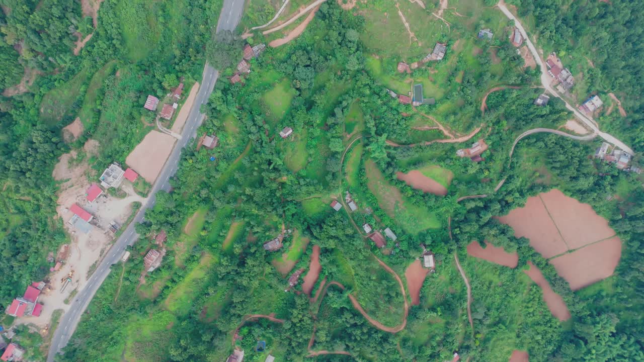 Beautiful hillside view of Tansen Palpa, Nepal, showcasing green mountains, traditional houses, and the peaceful charm of this historic hill town surrounded by nature