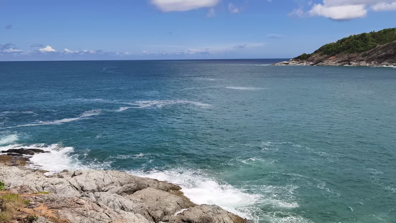Beautiful Tropical Beach Scenery with Rocky Coastline