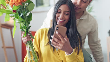 Couple,-flower-bouquet-or-phone-in-home-living