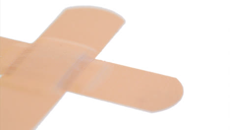 Plasters-arranged-crosswise-rotating-