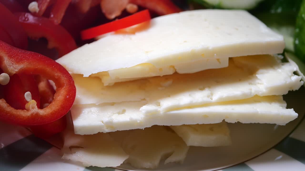 Cheese with red pepper and cucumber