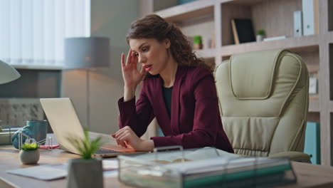 worried worker typing computer solving business problem at company workplace.