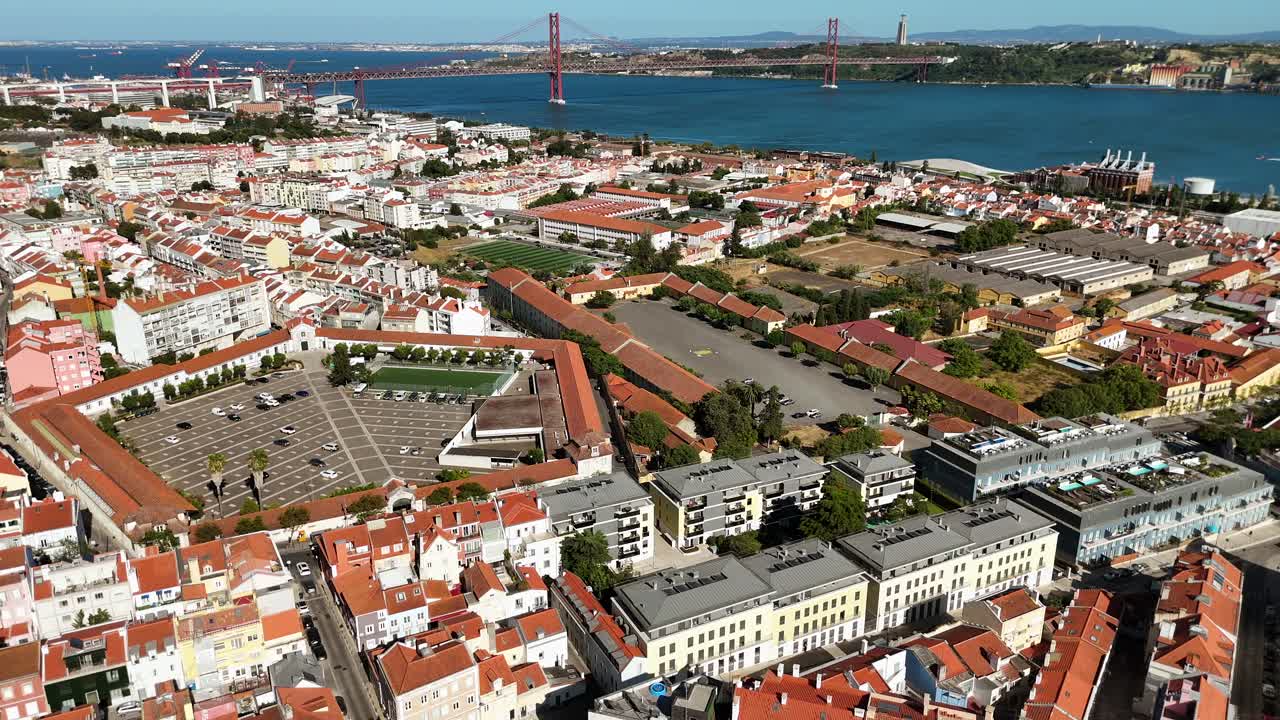 Aerial View of Lisbon Cityscape with 25 de Abril Bridge and Tagus River