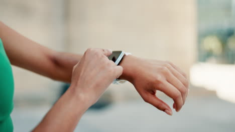 woman using smartwatch for fitness tracking