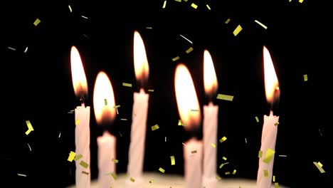 velas de cumpleaños con confeti cayendo