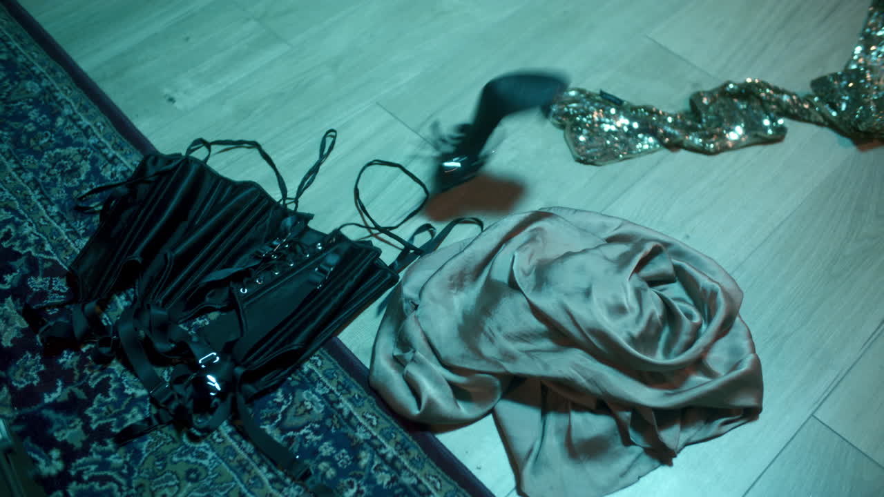 Corset and Scarf on Floor