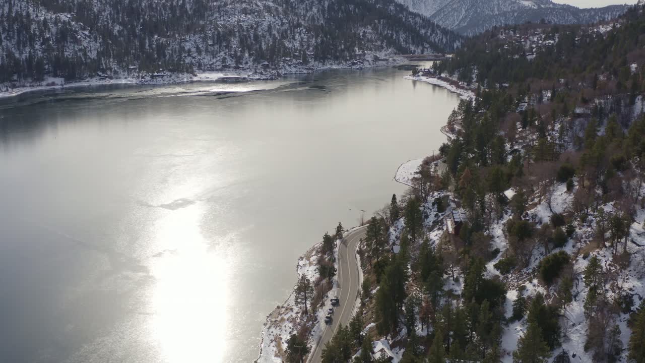 drone flying over bigbear lake frozen with ice