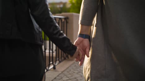 couple walking hand in hand