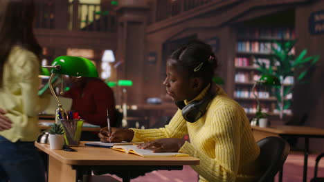 student studying in a library