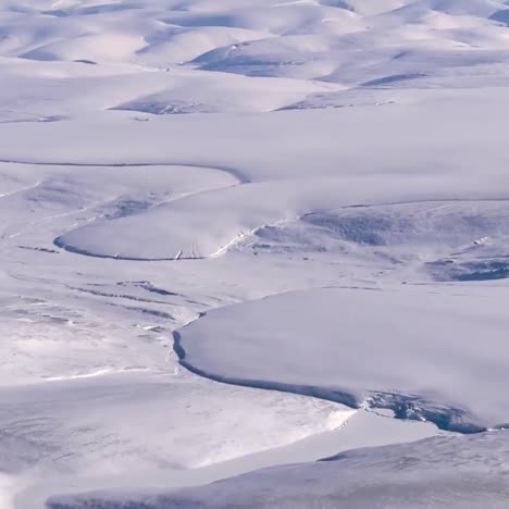 aerial over the jakobshavn glacier and ice sheet in greenland 2019