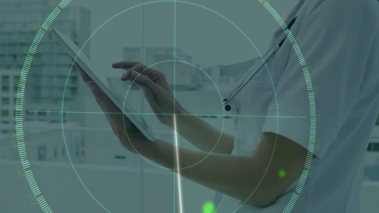 Using tablet with digital targeting interface, medical professional in hospital setting