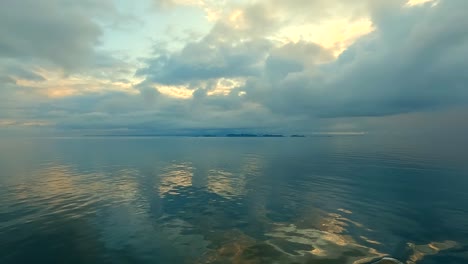 Sunrise-or-sunset-as-seen-from-a-cruise-ship-along-the-coast-of-Alaska---time-lapse