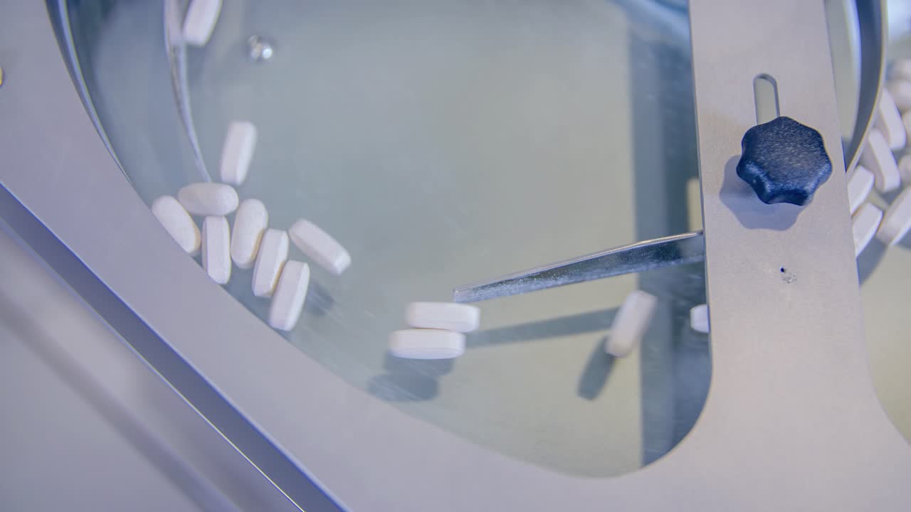 Counting process of pills for cure against COVID-19 in pharmaceutical factory